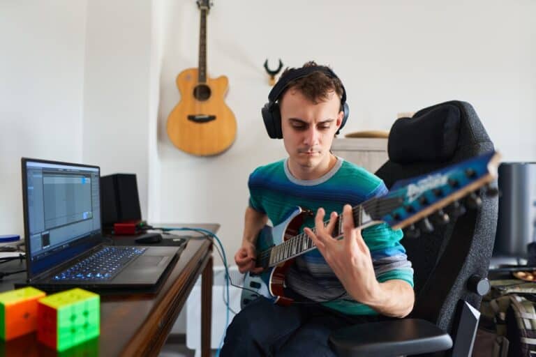 How To Play Electric Guitar With Headphones StepbyStep InstrumentGuys