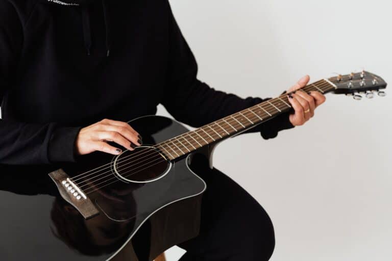 how-to-make-acoustic-guitar-sound-warmer-easy-tips-instrumentguys