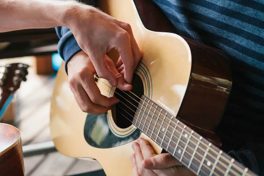 Train Your Fingers To Pick And Strum