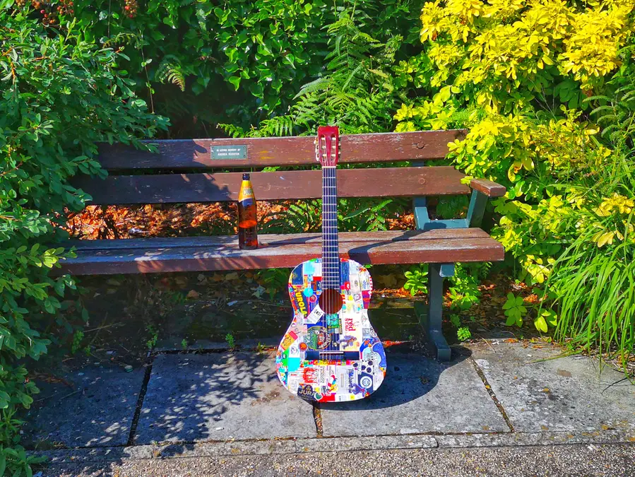 Put Stickers On Your Guitar's Bridge, Headstock, And Body